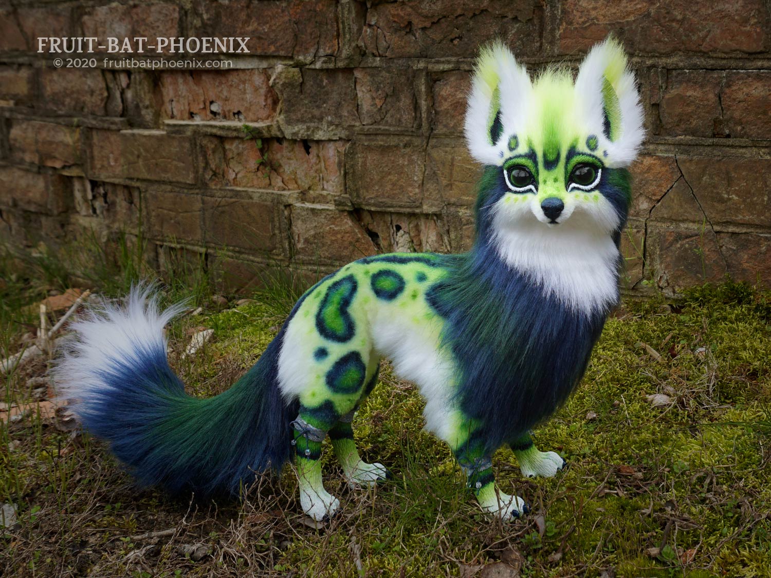 Fantasy fox art doll with blue and green spots