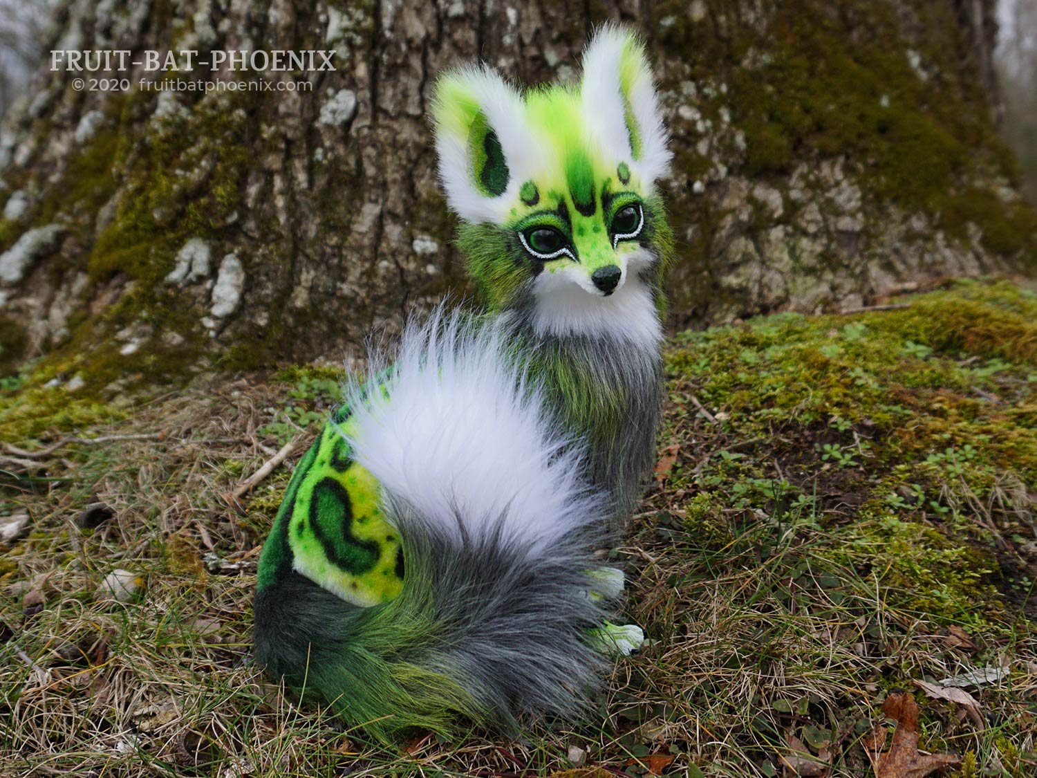 Chlorophyll Fox the posable creature sitting.