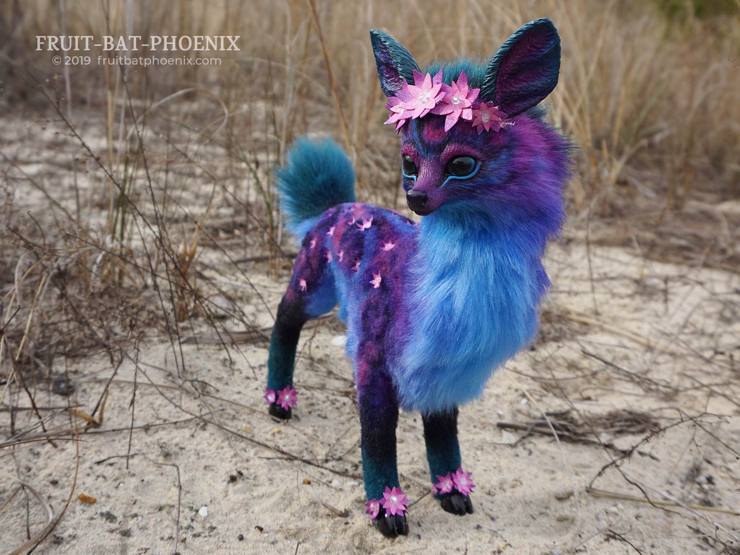 Galaxy Doe, the posable fantasy creature doll, looks over her shoulder