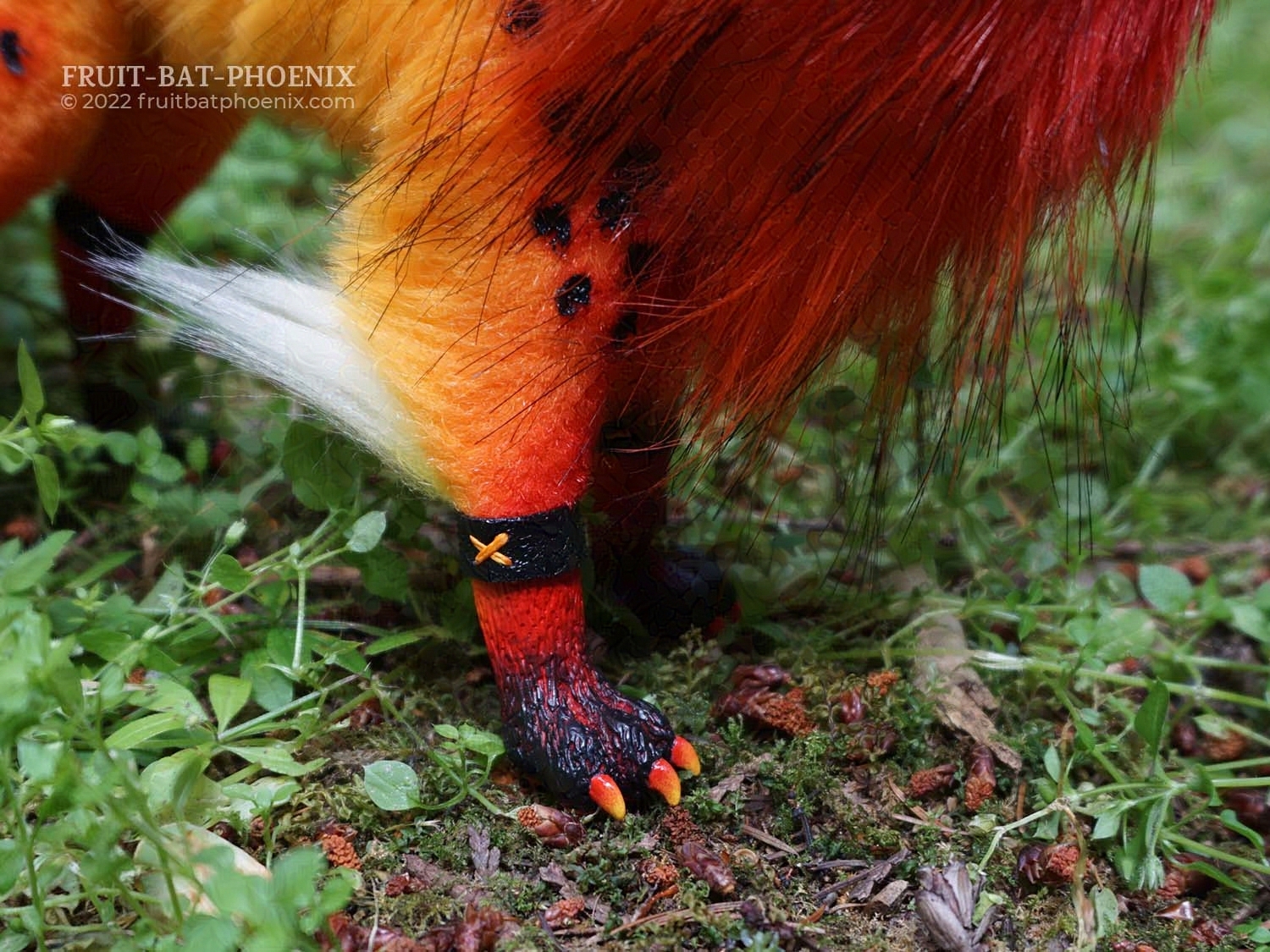 Lava fox posable art doll paw closeup