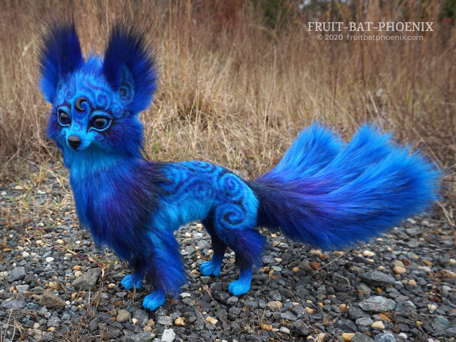 Tsuki the Midnight Kitsune, a blue posable art doll fox with three tails